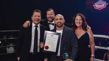 L-R: Paul Scully, Ryan Aitchison, Alexander Volkanovski and Alison Byrnes at the Battle of the Businesses Fight Night where the Premier's Award was given. Picture supplied