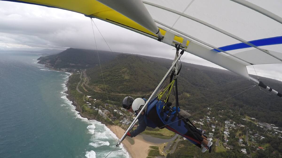 We'll just glide, starry-eyed: Stella Renfield of Tullimbah was delighted to receive a hang gliding trip at Stanwell Top for her 90th birthday. Picture: supplied