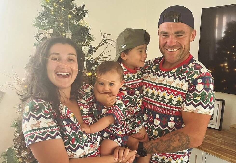 Keone Rawiri and Matthew Syron pictured with their children Brixon and Meka-Rose the day before Mr Syron flew to the UK. Picture: supplied

