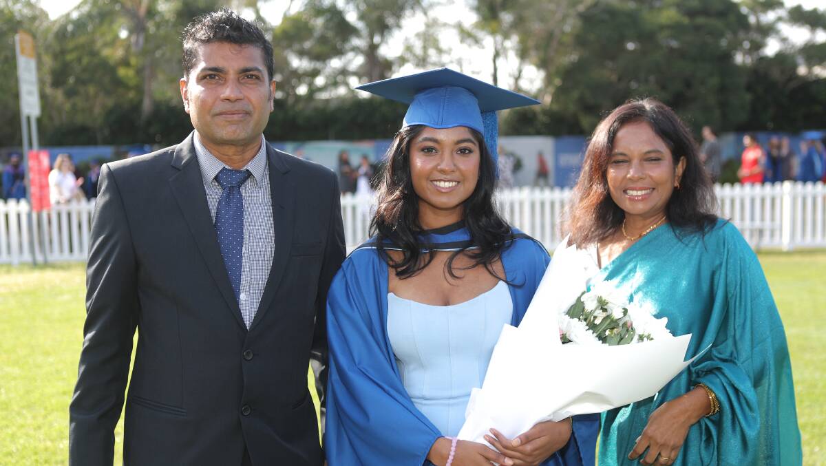 Ruwan and Dilani Perera support their daughter Deuni Perera as she graduates. Picture by Adam McLean