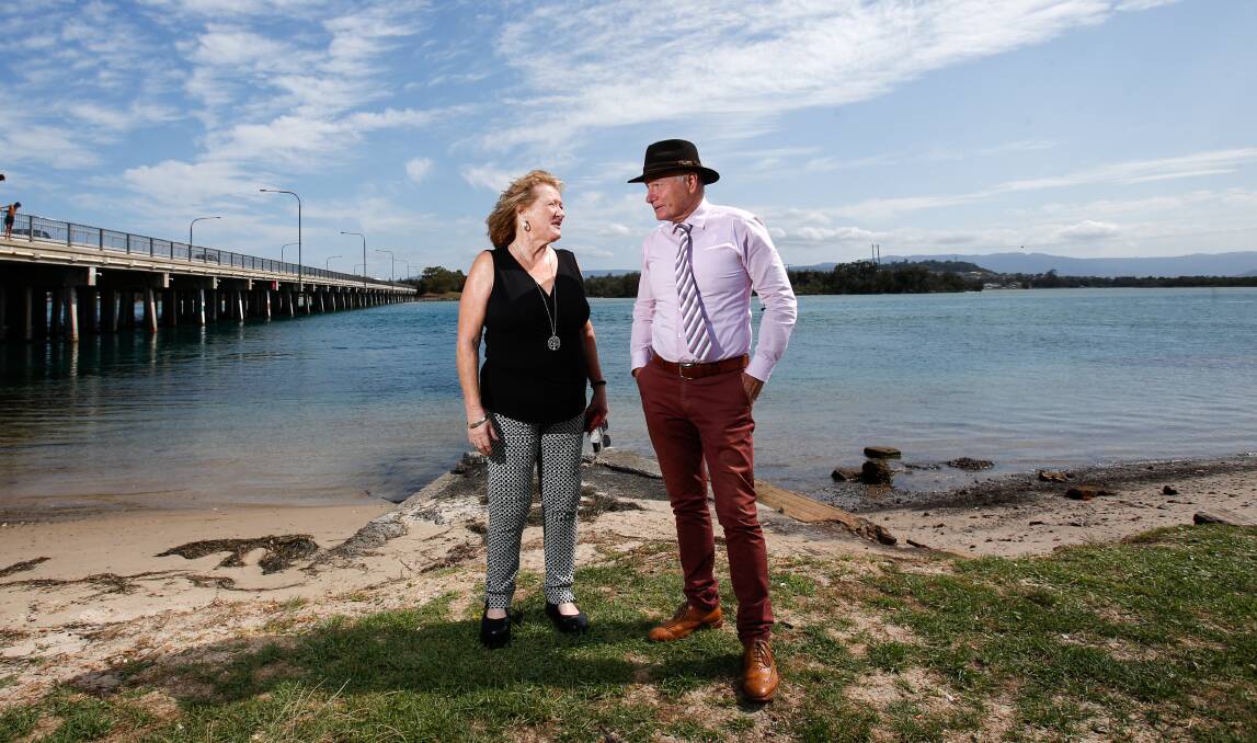 Unity a bridge too far: Shellharbour Mayor Marianne Saliba and Wollongong Lord Mayor Gordon Bradbery meet at Windang Bridge. The proposed merger between the two councils has been called off. Picture: Adam McLean