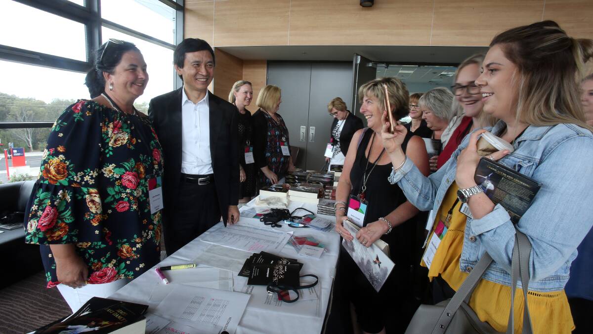 CareSouth staff hurriedly rushed to meet Li Cunxin at the conclusion of his speech at their "Ignite and Inspire" conference at the Innovation Campus on Wednesday. Picture: Robert Peet