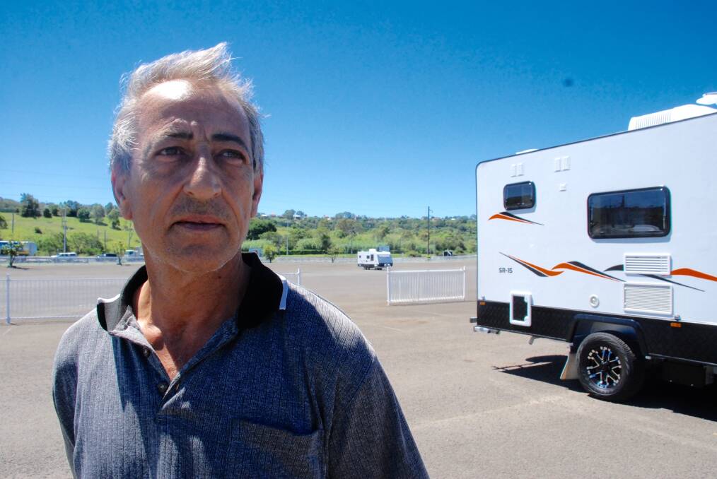 SURVIVOR: Joe Gomes' fibreglass-coated caravan was not damaged by Saturday's storm. He estimates 90 per cent of exhibitors at the Illawarra Camping and 4WD Show weren't as lucky. Picture: Angela Thompson