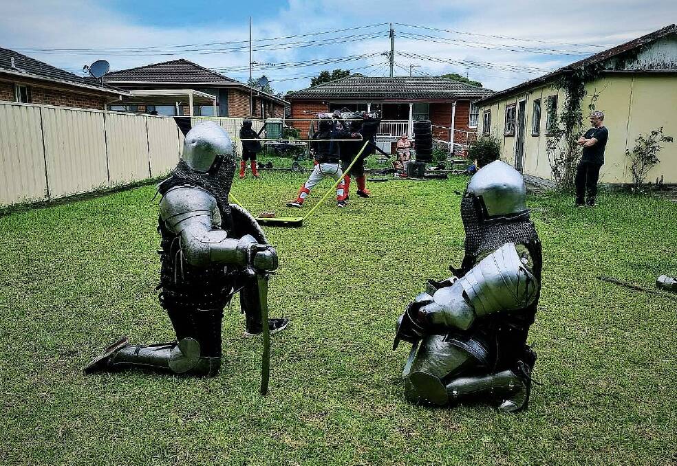 Members of the Knights of Albion practice in an Oak Flats backyard during the club's early days. Picture: supplied 