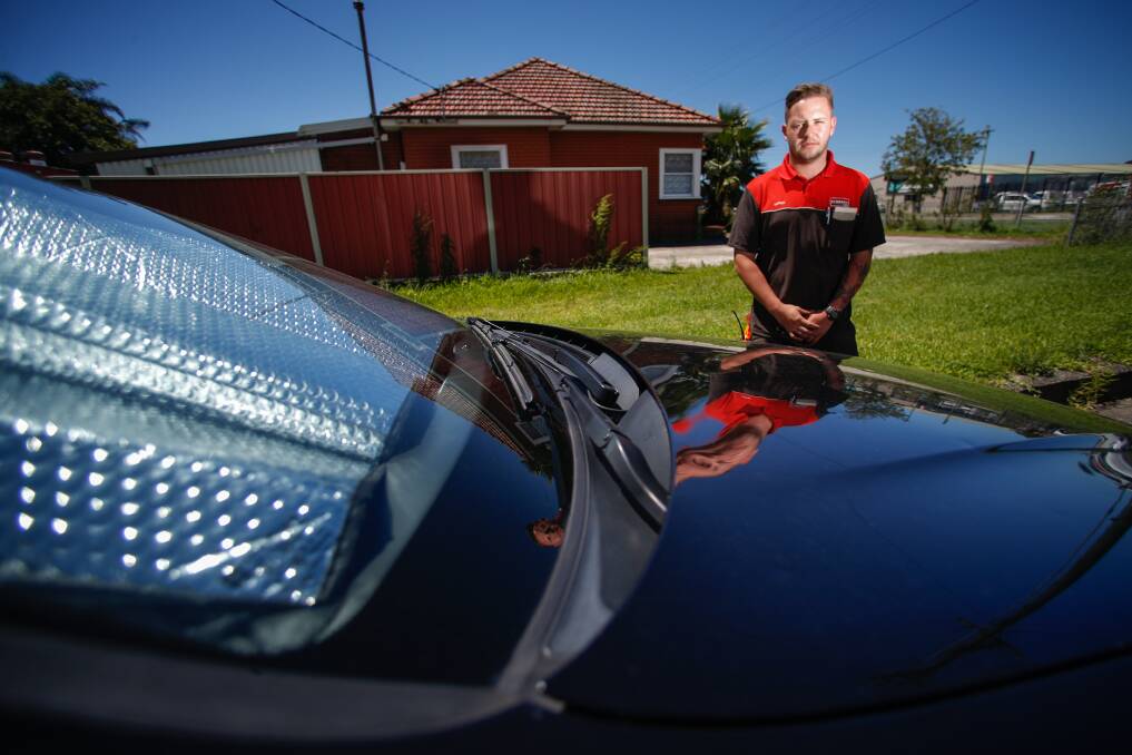 Jarrod Lenz's V8 was left covered in dents following Saturday's hail storm. He is among hundreds of Illawarra residents who will lodge a claim with NRMA. Picture: Adam McLean