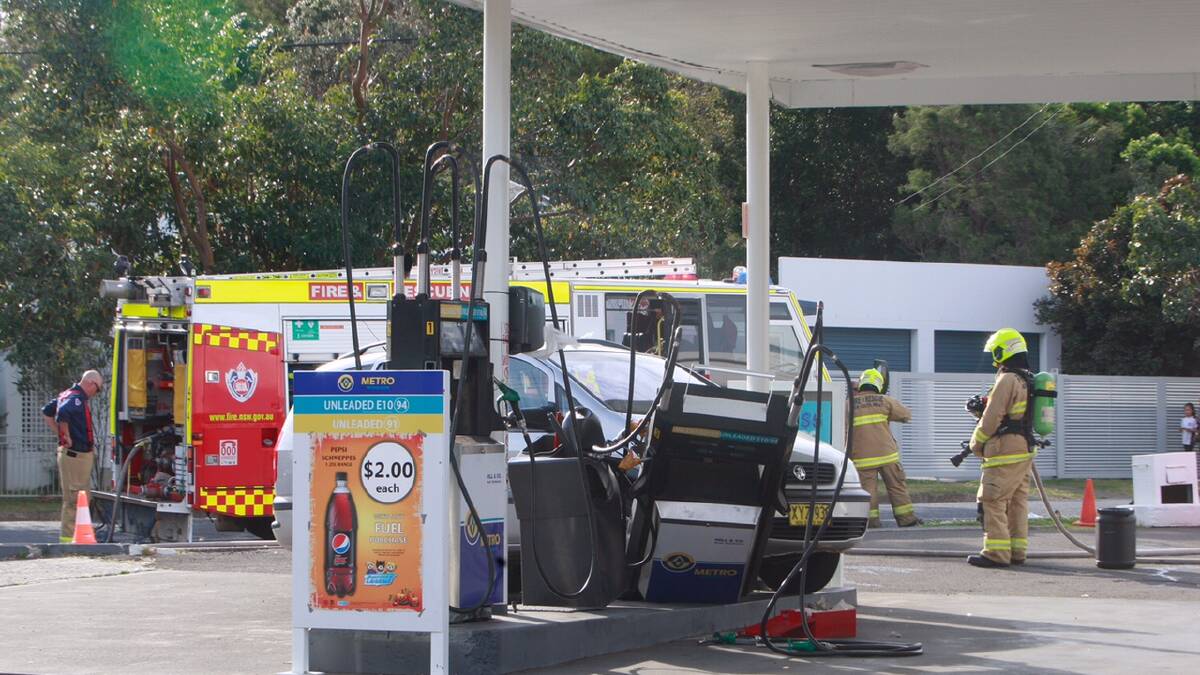 Keiraville crash: car takes out petrol bowser