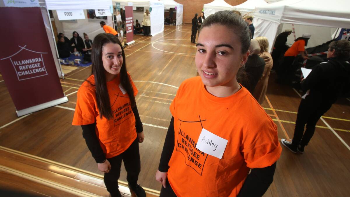 REFUGEE CHALLENGE: Warrawong High School students Seyda Atak and Ashley Mallia taking part in the Illawarra Refugee Challenge. Picture: Robert Peet