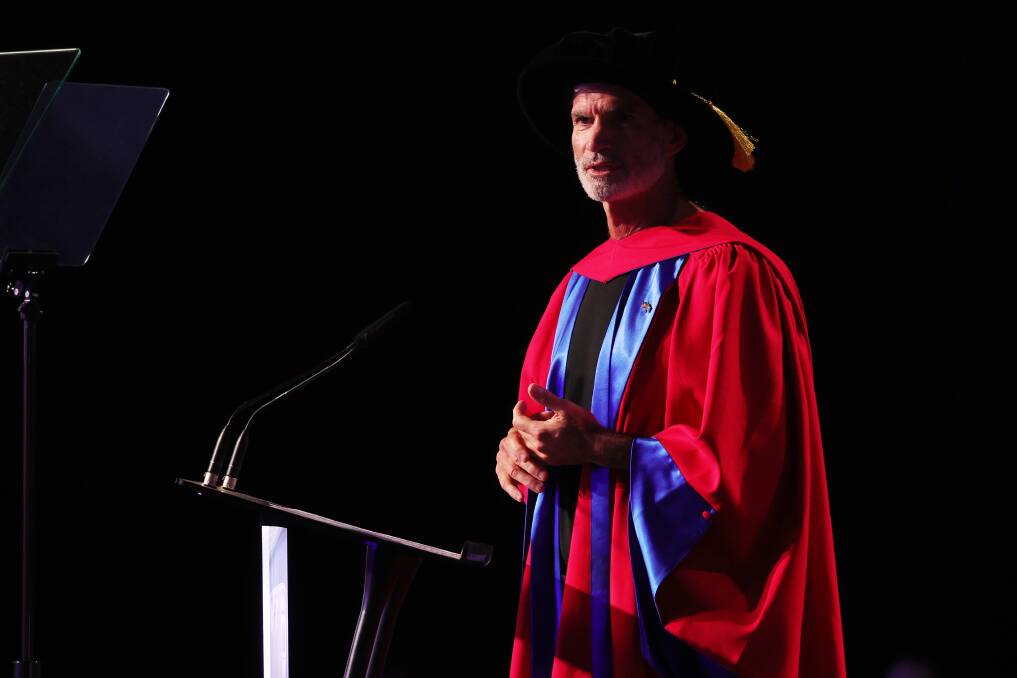 Craig Foster delivers the occasional address at a UOW graduation ceremony on Tuesday, April 16. Picture by Sylvia Liber