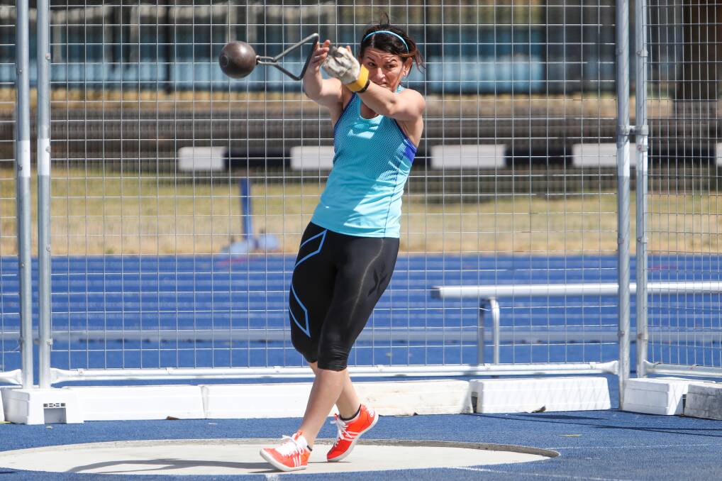 Weight throw: Maria Cimino contests the weight throw during the Australian Masters Winter Throwing Championships at Beaton Park. Pictures: Adam McLean