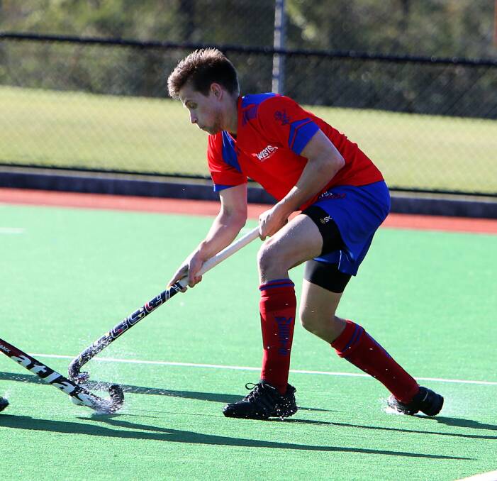 Unlucky: Wests' Abe Unicomb in action. Wests were leading 2-0 before going down 3-2 to University in the Illawarra hockey major semi-final on Sunday.