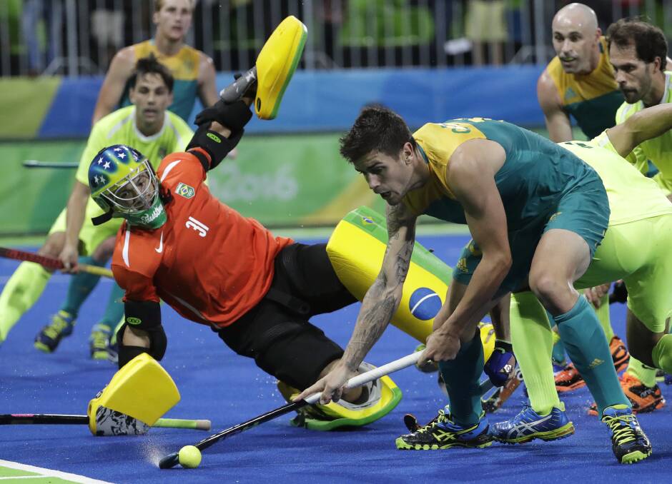 Aiming for Tokyo: Blake Govers in action against Brazil during a men's hockey match at the 2016 Summer Olympics in Rio de Janeiro.