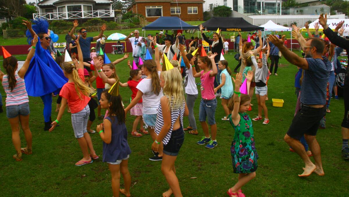 LET'S DANCE: A flash mob dance was held on November 8 at Austinmer Public School, as part of the school's Afternoon on the Green Fete.