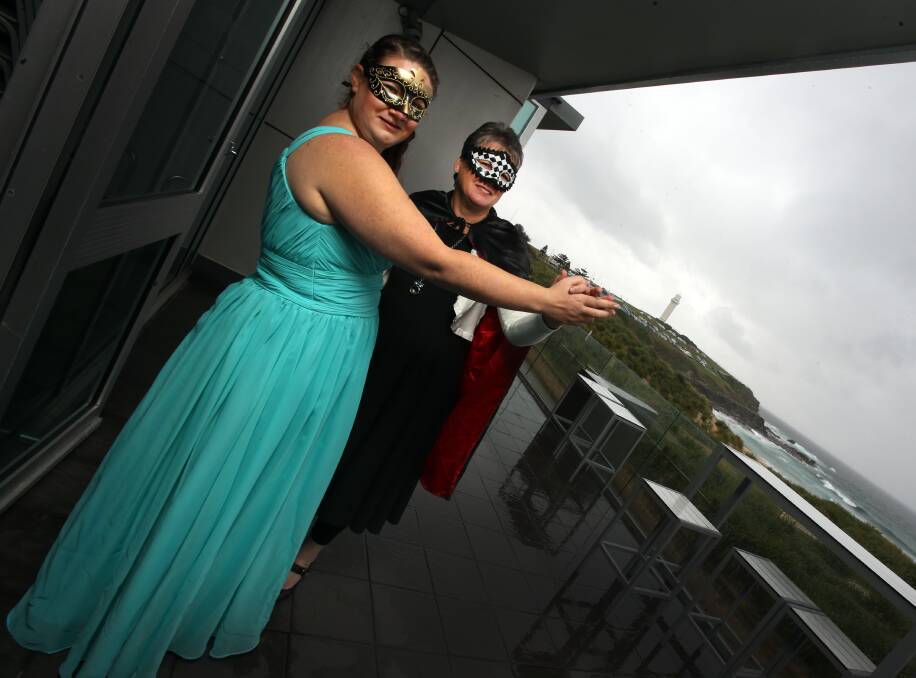 PARTY TIME: Citylife Community Initiatives' Amy Williamson and director Jill Whalan are set for the inaugural Masquerade Ball on September 3. Picture: Robert Peet 