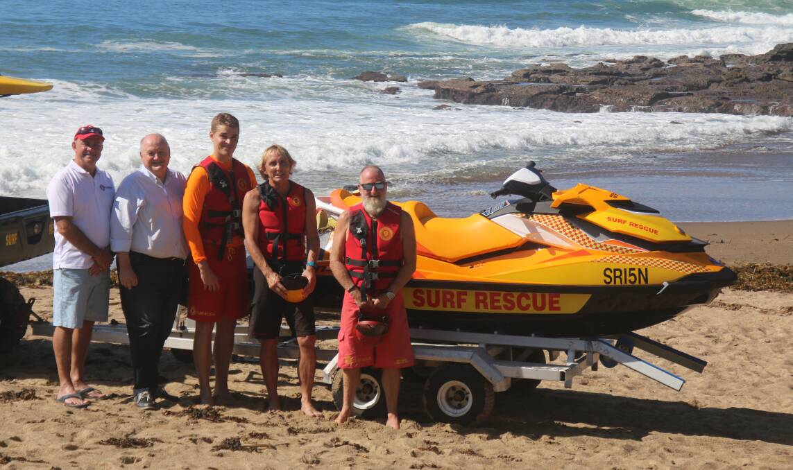 VITAL FUNDS: Val Zanotto (president of Surf Life Saving Illawarra) and Member for Heathcote Lee Evans with Leo Stevens, Rob Deacon and Barry Allen from the Coalcliff club. Picture: Supplied
