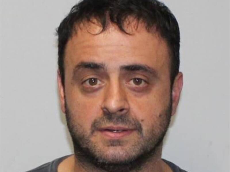 Omer Tok used a passport with a fake name to flee Australia while on drug-related charges. (HANDOUT/VICTORIA POLICE)