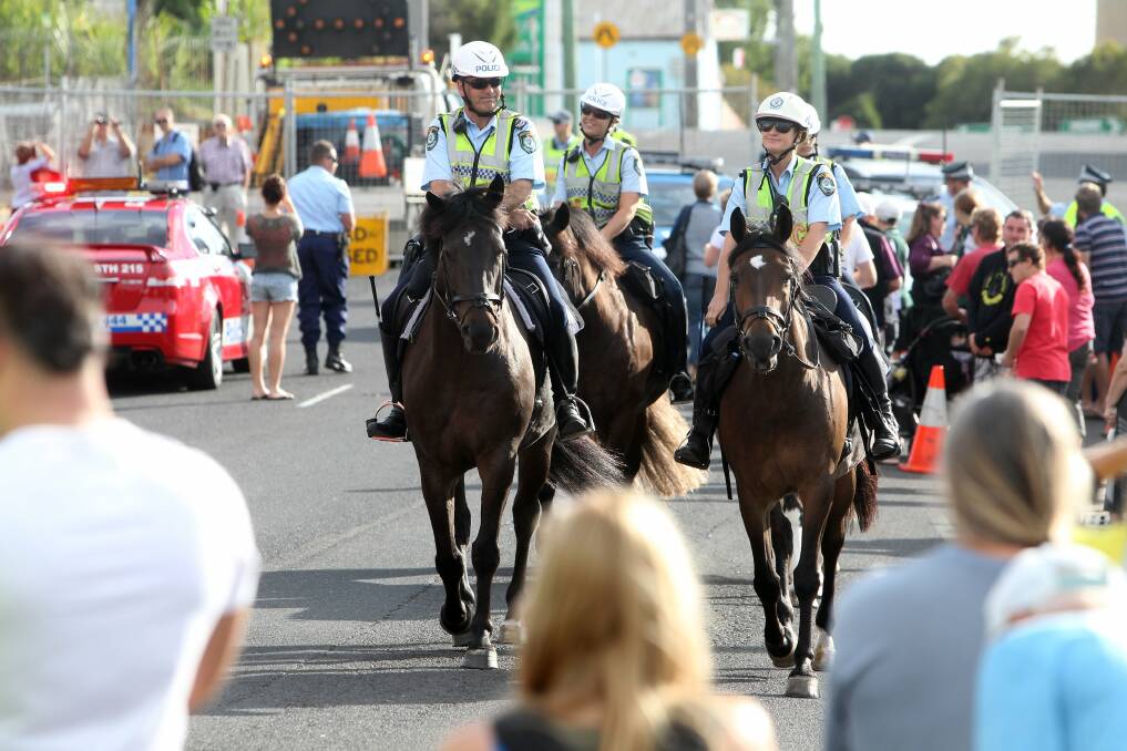 Mounted police at the Port Kembla Stack demolition. Picture: GREG TOTMAN