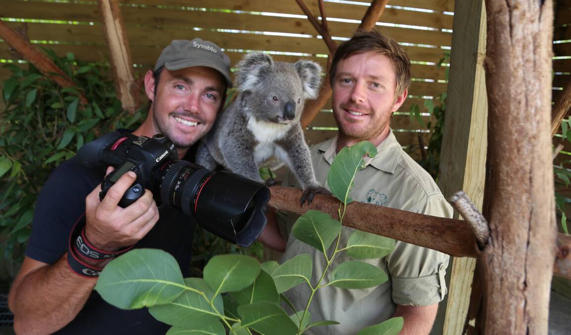 Winning grins: Social media sensation Kevin Fallon and general manager Matthew Radnidge in the new Koala Sanctuary at Symbio Wildlife Park. Picture: Greg Ellis.
