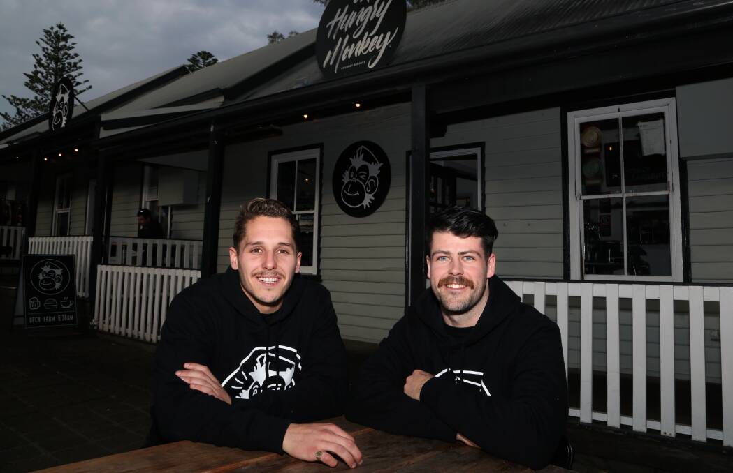 Plans to open a second restaurant: Jack Alexander and Taylor Hudson talking about their success outside The Hungry Monkey in Kiama. Picture: Greg Ellis.

