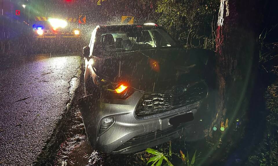 An abandoned station wagon was found smashed into a tree at Mount Keira in the early hours of Tuesday, March 19, 2024. Picture by Mount Keira Rural Fire Brigade