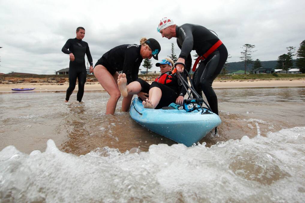 Sharn McNeill trains for the Cairns Ironman with the help of her friend Craig Gruber. Picture: SYLVIA LIBER