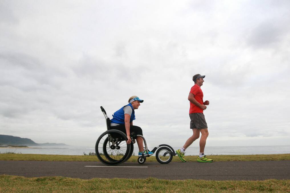 Sharn McNeill trains for the Cairns Ironman with the help of her friend Craig Gruber. Picture: SYLVIA LIBER