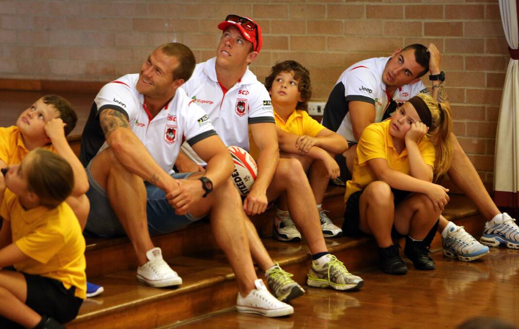 The Dragons during a presentation at Albion Park Rail Public School about stopping bullying. Picture: KIRK GILMOUR