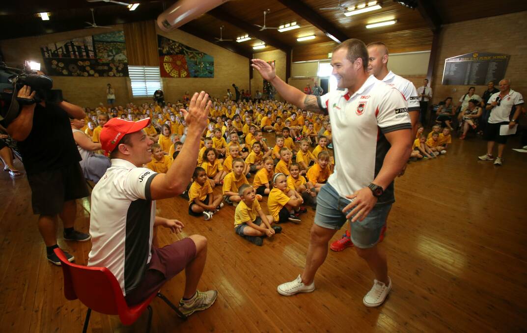 The Dragons during a presentation at Albion Park Rail Public School about stopping bullying. Picture: KIRK GILMOUR