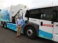 Chris Wade, regional manager at Remondis, and the hydrogen-powered garbage truck that has been picking up bins throughout the Illawarra. Picture by Robert Peet