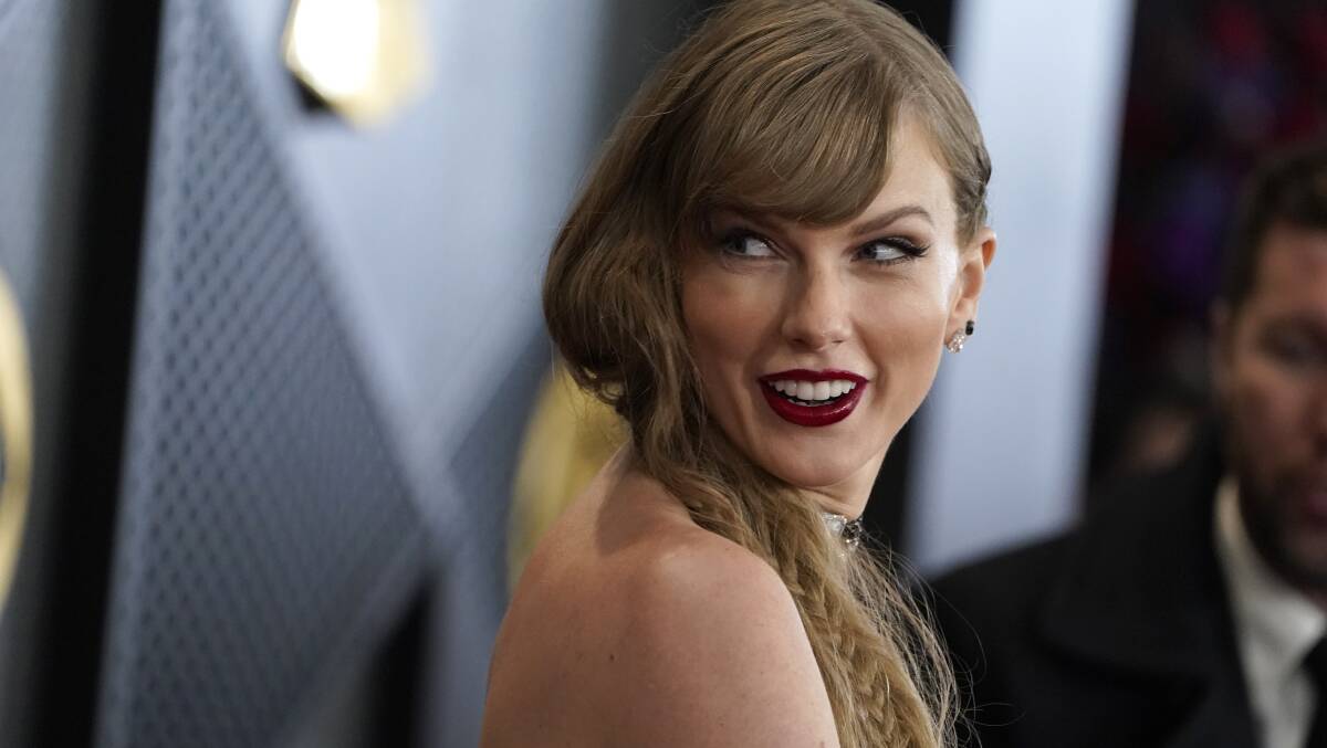 Taylor Swift arrives at the 66th annual Grammy Awards in Los Angeles. Picture by Jordan Strauss/Invision/AP