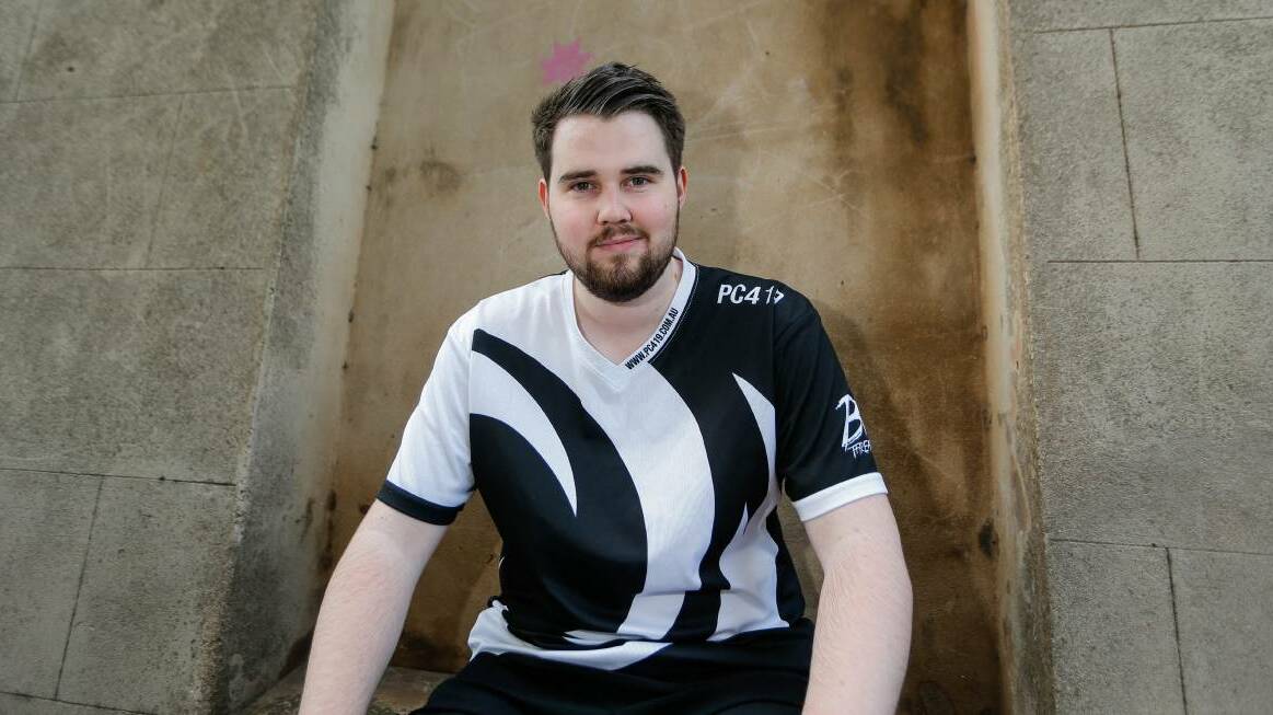 Game on: Warrnambool online gamer Billy Thomson wearing his PC419 team jersey. He wears the jersey to LAN (gaming) events. Picture: Anthony Brady 