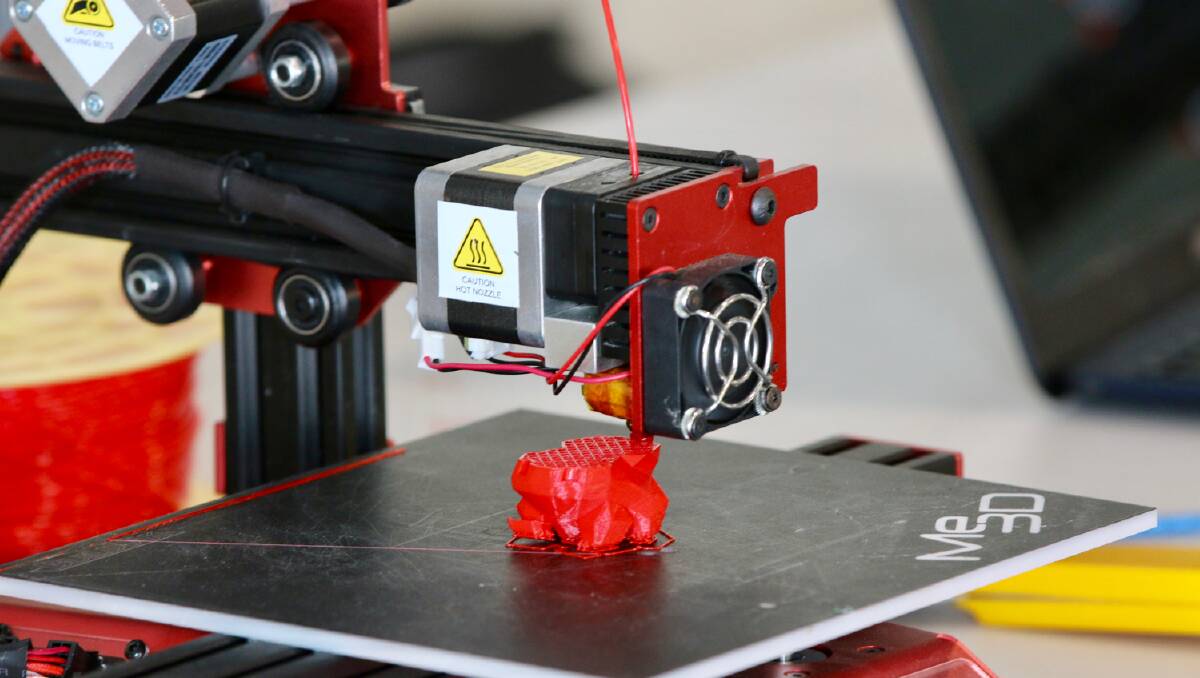 A 3-D printer in action: School students are learning first hand about this new technology thanks to STEM days with the University of Wollongong.