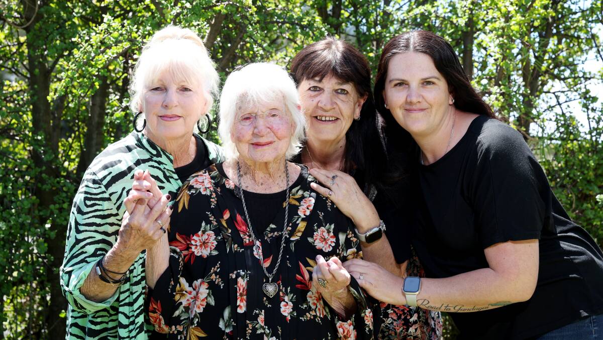 Newly-turned 100-year-old Joyce Townsend is flanked by, from left, daughters Pamela Hobbs, Gina Gerrey and granddaughter Kim Bowkett. Picture by Sylvia Liber