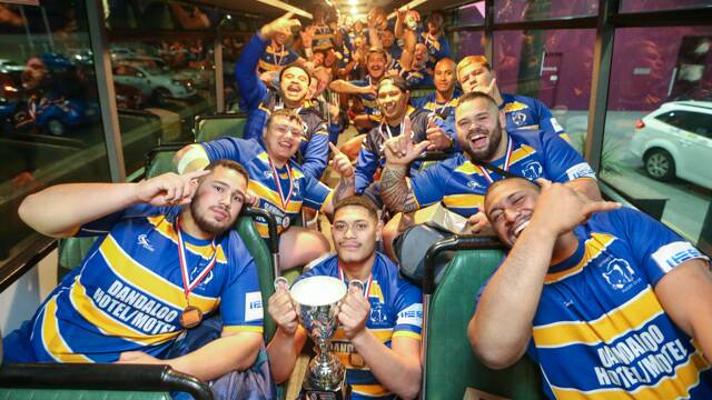 Party time: Avondale celebrate their Illawarra Rugby grand final victory on Saturday night. Picture: Adam McLean.