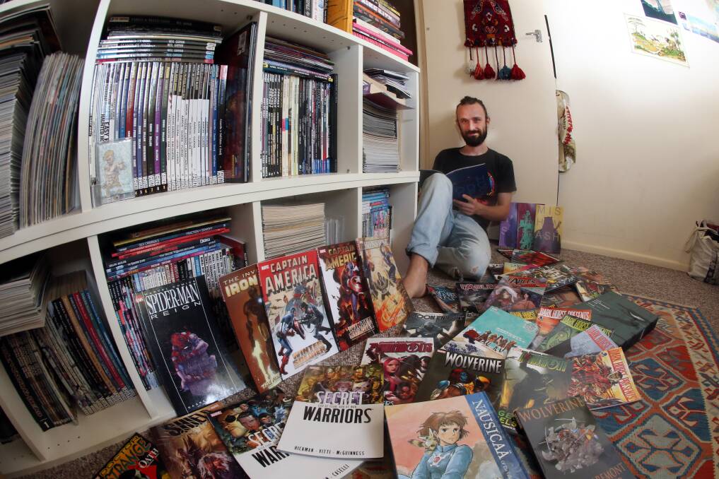 Illustrator Louie Joyce found a love for comics from his parents, his father collected them and his mother drew comic characters. Picture: Robert Peet