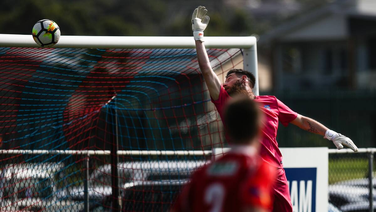 GOAL: Woonona goalkeeper Jacob Madden watches on as a Foxes effort sails into the back of the net at Ocean Park. Picture: ADAM McLEAN