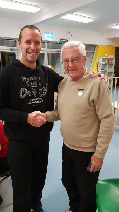 Honour:  IBS president Geoff Hynoski presents John Munro with life membership.