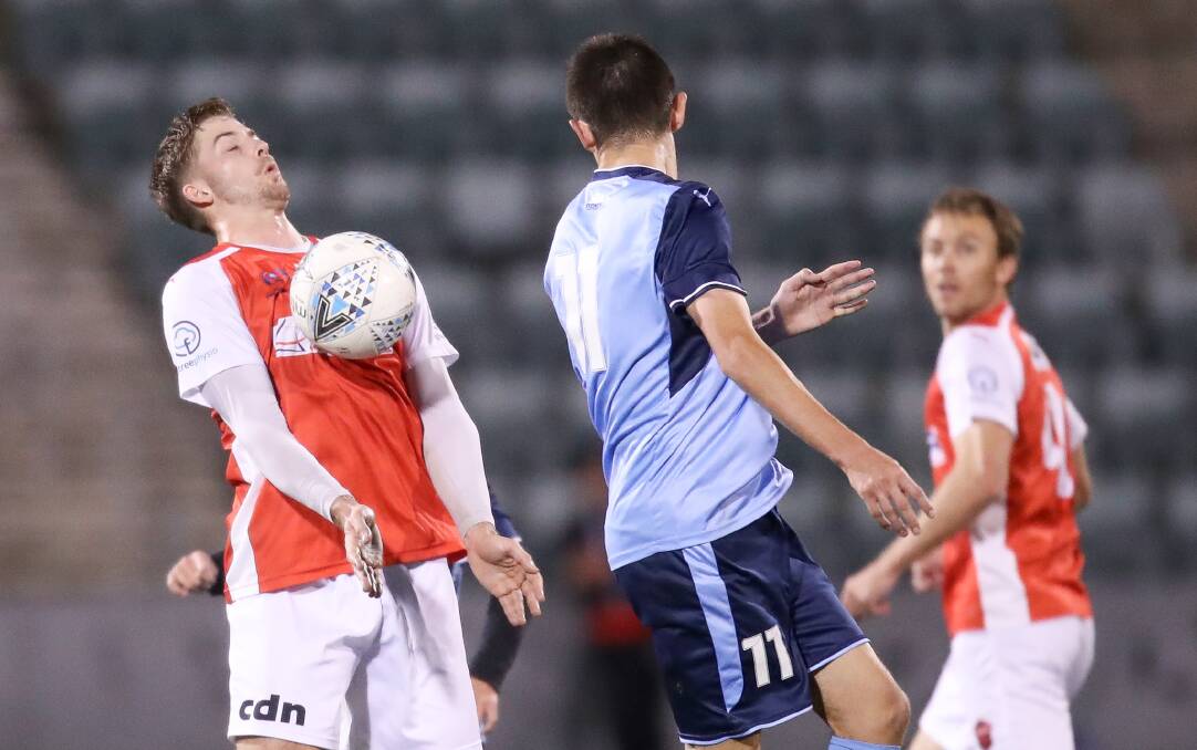 Control: Darcy Madden takes the ball off his chest against Sydney FC. Picture: Adam McLean