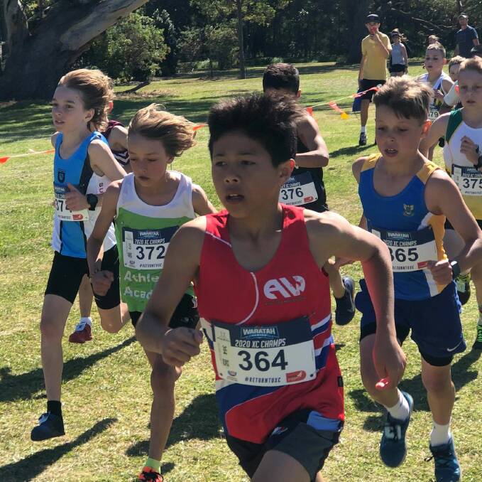 Up and running: Austin Craig competes in the under 11 boys cross country event at Kembla Grange. 