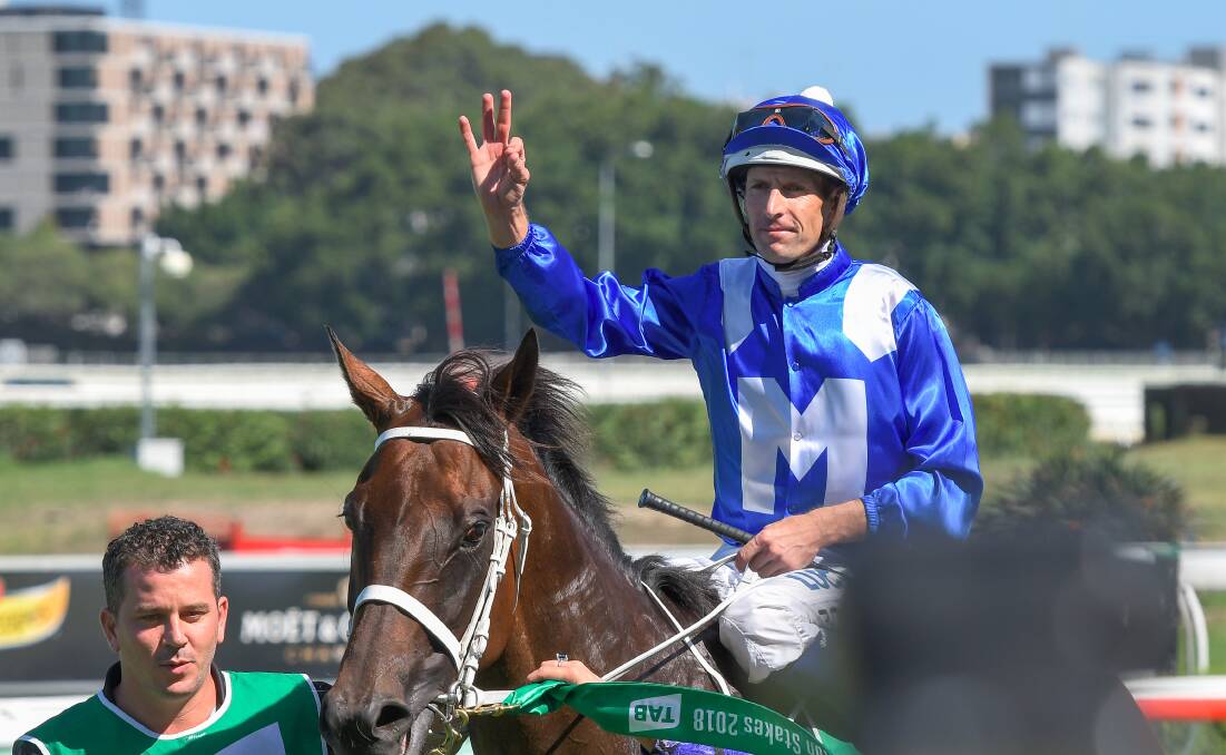 She's apples: Dunedoo's Hugh Bowman on board the amazing Winx, one of the great combinations of the Australian turf.