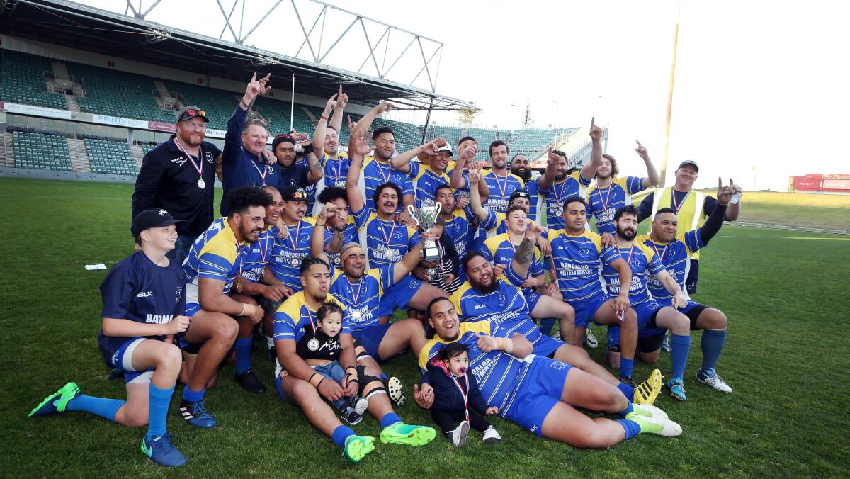 TWENTY WINS STRAIGHT: Avondale players celebrate their llawarra Rugby grand final win over Vikings at WIN Stadium. Picture: Sylvia Liber.