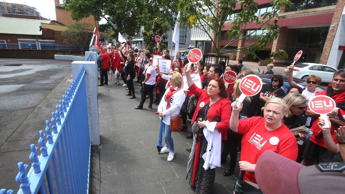 AGREEMENT REACHED: Catholic teachers did a protest march through Wollongong to the Catholic Education Office last November. Picture: Robert Peet