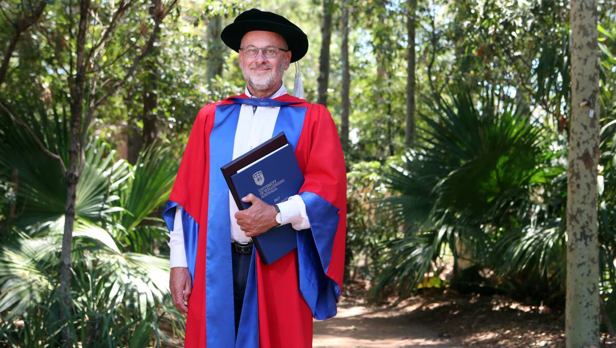 HONOUR: Renowned scientist Professor Tim Flannery awarded an Honorary Doctorate of Science from UOW. Picture: Sylvia Liber.
