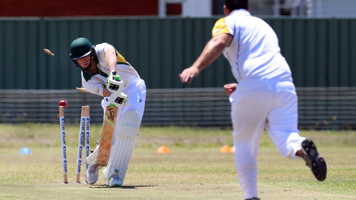 HOWZAT: Gerringong's Manning Berry gets dismissed. Picture: Sylvia Liber.
