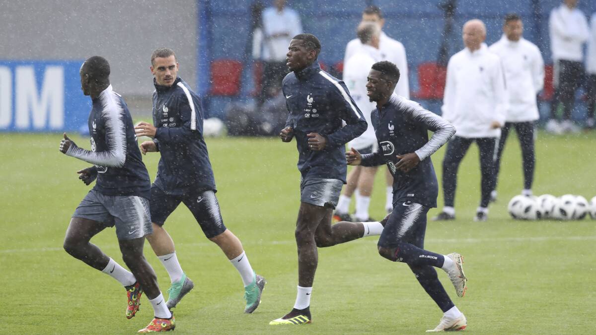 SOCCEROOS' MAIN THREAT: France's Benjamin Mendy, Antoine Griezmann, Paul Pogba and Ousmane Dembele training in Russia ahead of the World Cup fixture against Australia on Saturday, June 16. Picture: AP Photo/David Vincent