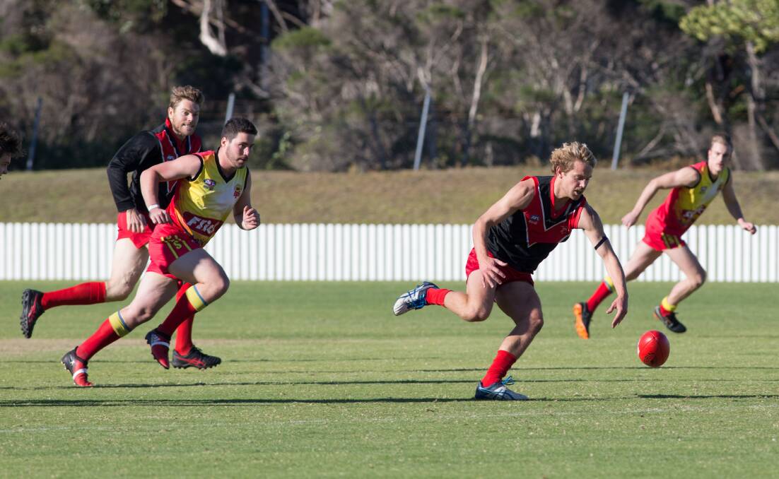 Lead the way: Wollongong Lions player Lachlan Maples takes possession against Shellharbour on Saturday. Picture: Georgia Matts