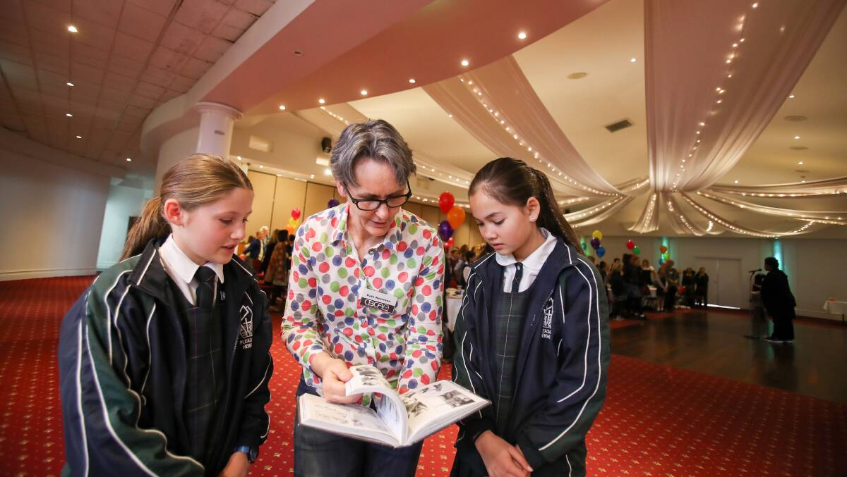 LITERARY LUNCH:   Award-winning illustrator Dale Newman with Pleasant Heights Public School students Zoe McClatchie and Natalie Harding. Picture: Adam McLean