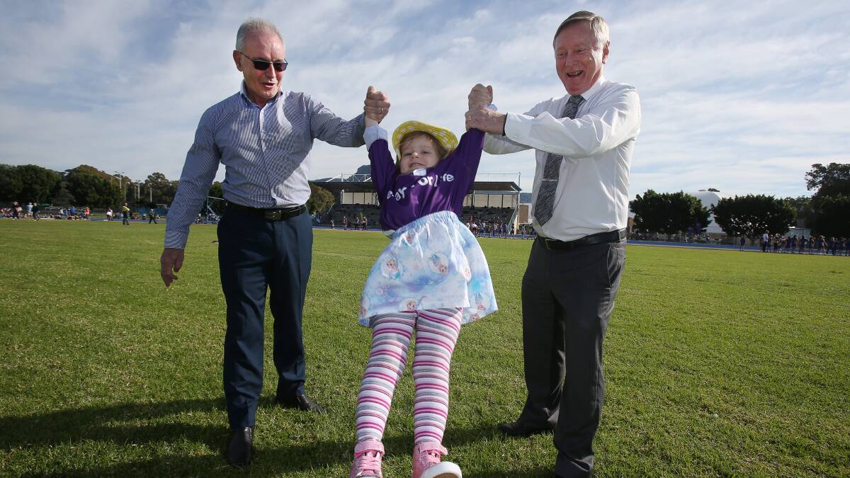 Launch: Wollongong Relay for Life chairman Stuart Barnes, participant Avah Bower and patron, newsreader Geoff Phillips, at Beaton Park to launch the 2017 event. Picture: Robert Peet