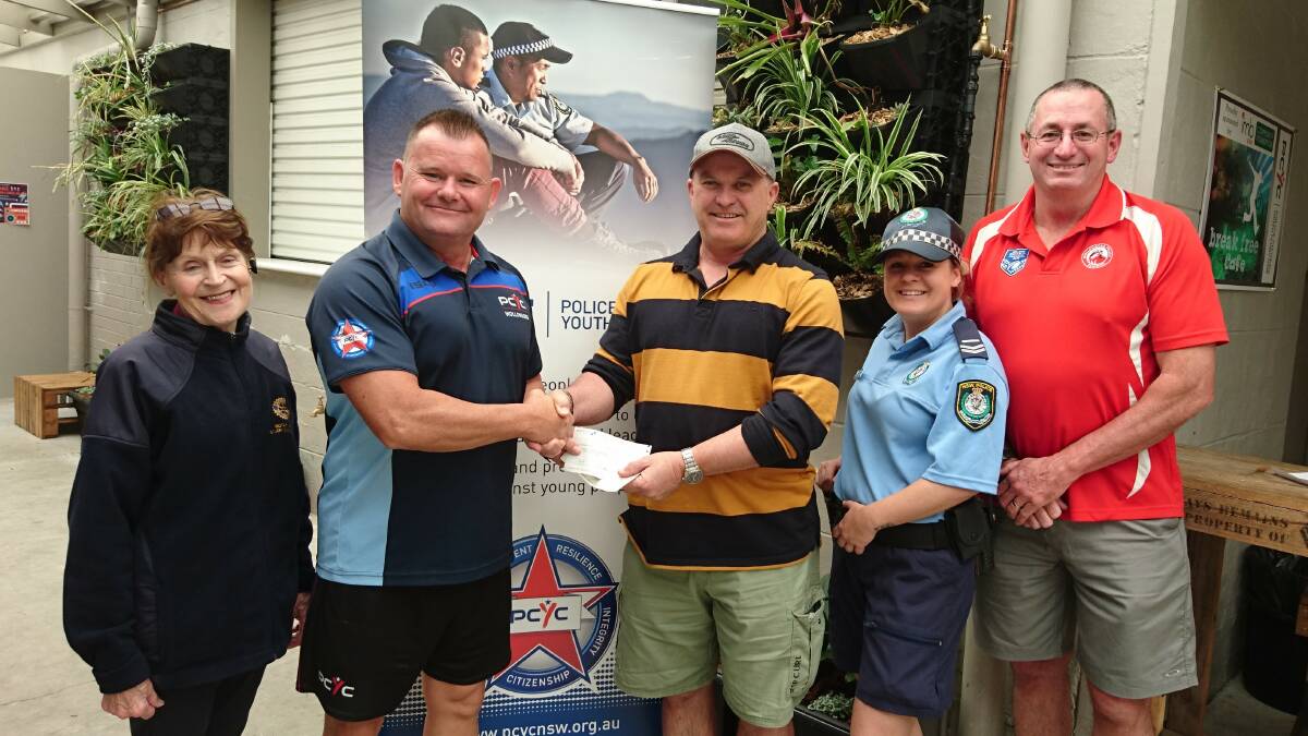 Team effort: Wollongong Rotary president Dot Hennessy, PCYC manager Michael Jones, Graeme Donnelly Cup Committee chairman  Brian Wyver; PCYC's Snr Const Cate Johnston and project organiser Sgt Bob Minns.