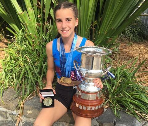Exciting future: Albion Park Primary's Delta Amidzovski holding the Queen Elizabeth Trophy she won at the NSW PSSA Championships. 