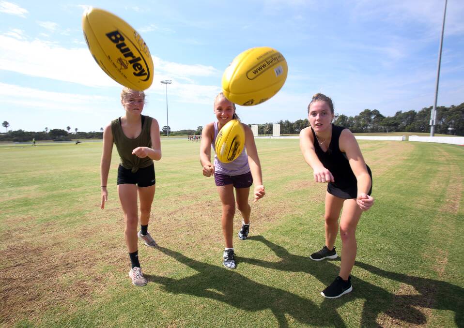 Pathway: Brianna Davies, Kiara Camilleri and Morgan Faulkner at the launch of the IAS 14-16 girls development pathway for women's AFL players.